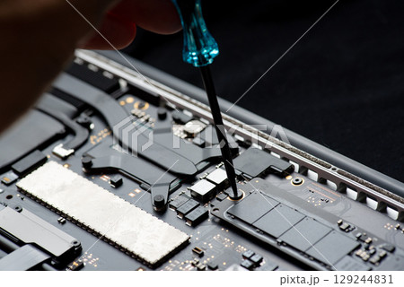Abstract, Close up at electronic circuits, we see the technology of the mainboard, which is the important background of the computer.logic board,cpu motherboard,Main board,system board,mobo Abstract, Close up at electronic circuits, we see the technology of the mainboard, which is the important background of the computer.logic board,cpu motherboard,Main board,system board,mobo 129244831