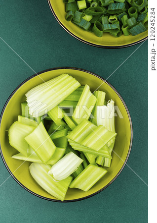 Celery stalks, green stalks, freshly harvested. Celery stalks, green stalks, freshly harvested. 129245284