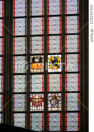 Stained glass windows of the Church of Saint Bavo Grote Kerk, Reformed Protestant church in Haarlem, Netherlands 129245305