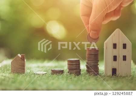 Saving money Installment for bigger house mortgage, Home loan cost bank saving real estate expense, Property economy concept. Saving money Installment for bigger house mortgage, Home loan cost bank saving real estate expense, Property economy concept. 129245887