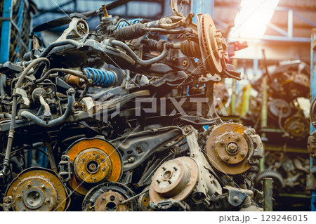 stock pile of used auto parts store for sale recycle, car old wheel hub spare part from scrapyard stock pile of used auto parts store for sale recycle, car old wheel hub spare part from scrapyard 129246015