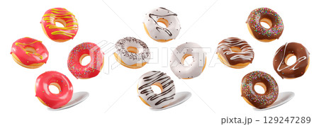 Assorted donuts with colorful icing, sprinkles, and chocolate isolated on white transparent background 129247289