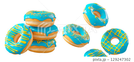 Donuts with blue blueberry glaze, sprinkles, white drizzle, and dots isolated on white transparent background 129247302