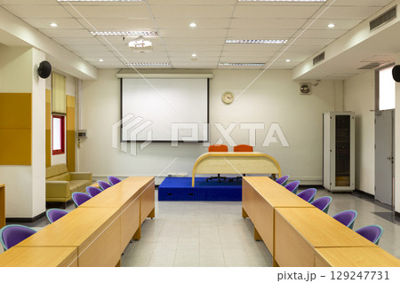 Interior conference room, meeting room, boardroom, Classroom, Office, with white projector board. 129247731