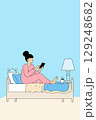 Woman Using Tablet in Bed 129248682