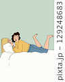 Woman Relaxing on Bed 129248683