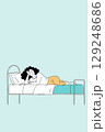Woman Resting on Bed 129248686