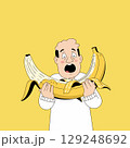 Surprised Man Holding a Giant Banana 129248692