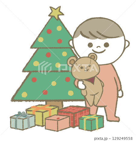 クリスマスツリーの横に立つ子供 クリスマスツリーの横に立つ子供 129249558