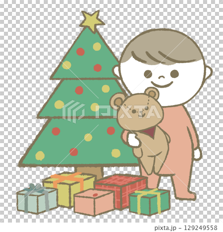 クリスマスツリーの横に立つ子供 クリスマスツリーの横に立つ子供 129249558