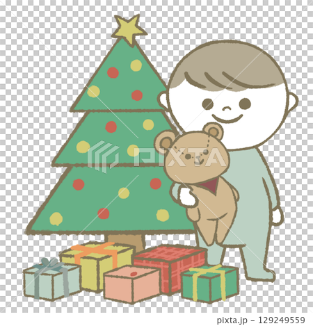 クリスマスツリーの横に立つ子供 129249559