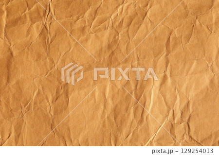 Brown creased kraft paper texture Brown creased kraft paper texture 129254013