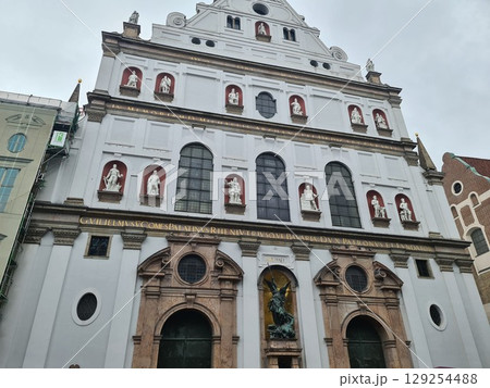 Munich, Germany - July 27, 2025: Facaed of St. Michael's, Jesuit church in Munich, capital city of Bavaria. It is the largest Renaissance church north of the Alps, early Baroque architecture Munich, Germany - July 27, 2025: Facaed of St. Michael's, Jesuit church in Munich, capital city of Bavaria. It is the largest Renaissance church north of the Alps, early Baroque architecture 129254488