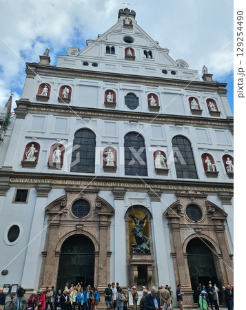 Munich, Germany - July 27, 2025: Facaed of St. Michael's, Jesuit church in Munich, capital city of Bavaria. It is the largest Renaissance church north of the Alps, early Baroque architecture Munich, Germany - July 27, 2025: Facaed of St. Michael's, Jesuit church in Munich, capital city of Bavaria. It is the largest Renaissance church north of the Alps, early Baroque architecture 129254490
