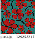 Red flowers on a green background 129258215