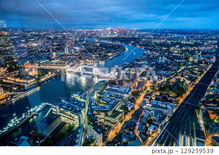 London at night with urban architectures and Tower Bridge 129259539