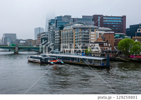 Foggy cityscape of London from Thames river 129259801
