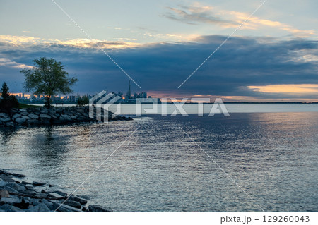 view of Toronto skyline at sunrise from humber bay park canada view of Toronto skyline at sunrise from humber bay park canada 129260043
