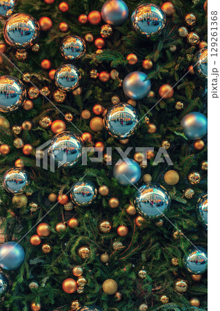 Christmas pattern with green branches pine, golden and silver shiny baubles 129261368
