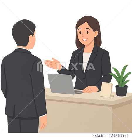 会社ロビーで来客対応している受付スタッフの女性 129263556