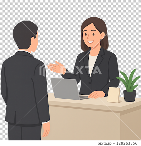 会社ロビーで来客対応している受付スタッフの女性 129263556
