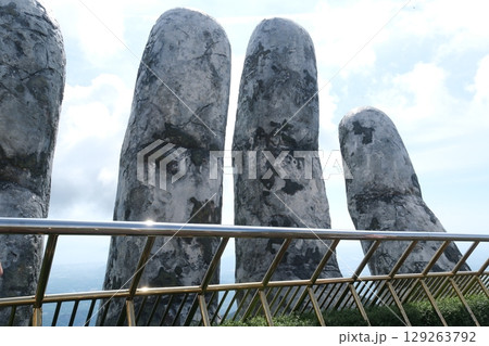 Da Nang, Vietnam Golden Bridge stone hand bridge and mountain view observatory at the Ba Na Hills Sunworld in DaNang Vietnam 129263792