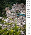 Aerial View Of Rocinha Favela In Rio De Janeiro: Dense Urban Landscape With Colorful Rooftops And Narrow Streets In The Largest Informal Settlement In Brazil 129264299
