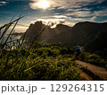 Golden Sunset Over Rio De Janeiro From Two Brothers Mountain: Dramatic Sunbeams Streaming Through Coastal Peaks Above The Atlantic Ocean And Leblon Beach 129264315