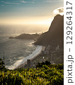 Golden Sunset Over Rio De Janeiro From Two Brothers Mountain: Dramatic Sunbeams Streaming Through Coastal Peaks Above The Atlantic Ocean And Leblon Beach 129264317