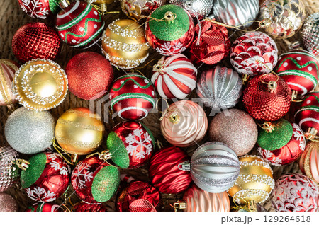 Group of Christmas ornaments prepare for decorative to a Christmas tree. Hanging religious ornaments on a tree was a way to honor the true meaning of Christmas, Jesus Christ's birth. Group of Christmas ornaments prepare for decorative to a Christmas tree. Hanging religious ornaments on a tree was a way to honor the true meaning of Christmas, Jesus Christ's birth. 129264618
