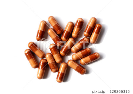 Brown collagen capsules for skin health. Brown collagen capsules for skin health. 129266316