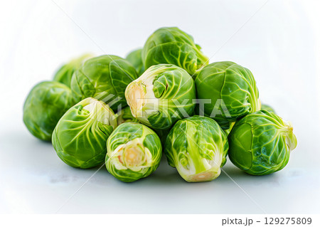 Small heap of brussels sprouts on white background 129275809