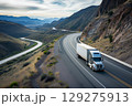 American long-nose semitruck on a highway 129275913
