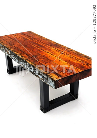 Wooden table with a black frame and a brown top 129277092