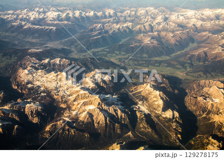 beautiful mountain landscape on high rocks from the height of the flight of the plane beautiful mountain landscape on high rocks from the height of the flight of the plane 129278175