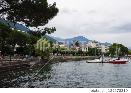 beautiful ships and boats are moored near the shore 129278210