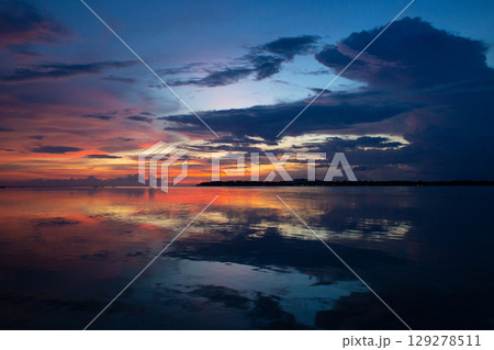 beautiful dramatic landscape of sunset on the sea beach beautiful dramatic landscape of sunset on the sea beach 129278511