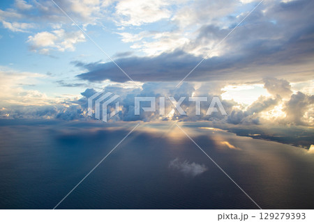 beautiful thick clouds in the sky from the height of the flight of the plane with a view of the continent and countries beautiful thick clouds in the sky from the height of the flight of the plane with a view of the continent and countries 129279393