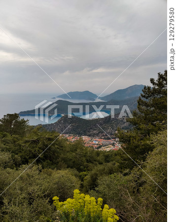beautiful landscape from babadag mountain to Oludeniz beach in Turkey beautiful landscape from babadag mountain to Oludeniz beach in Turkey 129279580