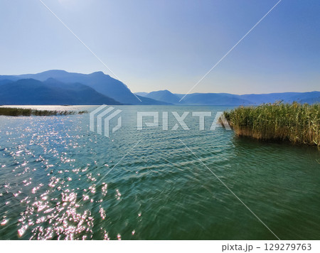 beautiful landscape of the lake against the background of mountains 129279763