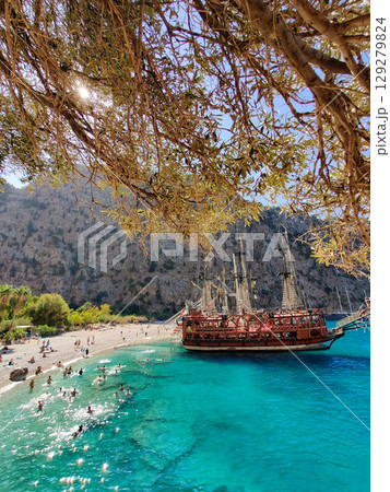 a beautiful ship is sailing in the blue sea jn Turkey Valley of Butterflies 129279824
