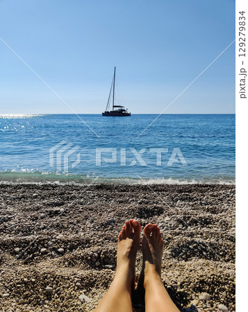 a beautiful ship is sailing in the blue sea 129279834