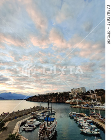 beautiful ships and boats are moored near the shore 129279873