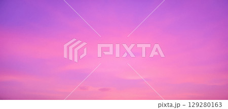 Minimalist abstract background colorful sky gradient over a dark horizon, showing beautiful transition from purple to pink and orange 129280163