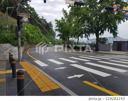 high voltage post over a building 129281243