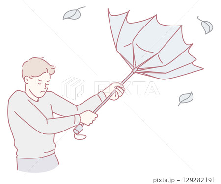 Experiencing difficulties while trying to manage an umbrella during windy weather conditions 129282191
