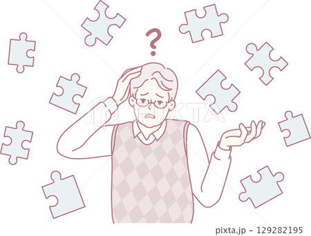 A man is surrounded by scattered puzzle pieces, symbolizing his struggle with confusion 129282195