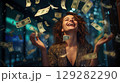 Woman catching falling money 129282290