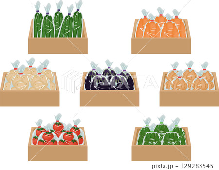木箱に入った袋詰めの野菜 129283545
