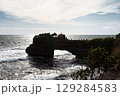 Batu Bolong Beach,Batu Bolong temple at Tanah Lot temple area in Bali island of Indonesia 129284583